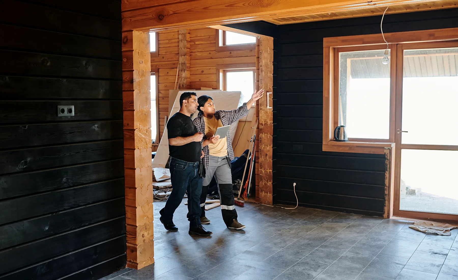 Contractor and homeowner reviewing a renovation project