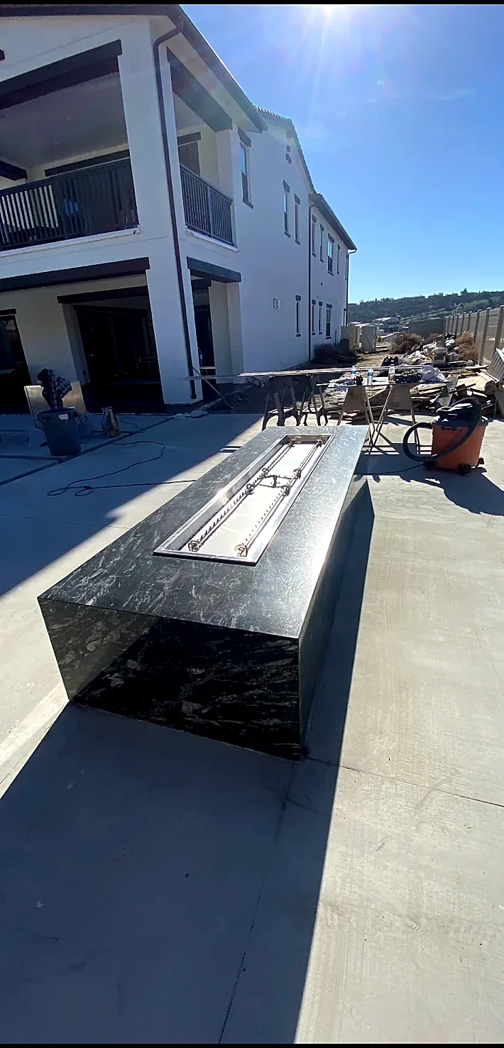 Custom stone outdoor fire table