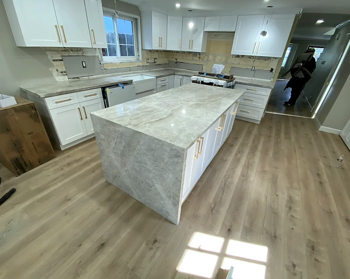 White kitchen with waterfall island